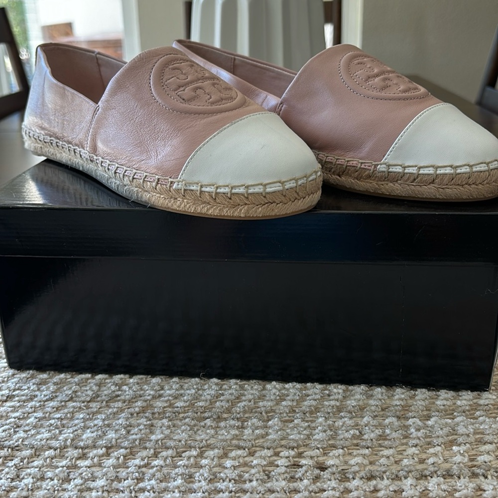 Tory Burch pink and white shoes.